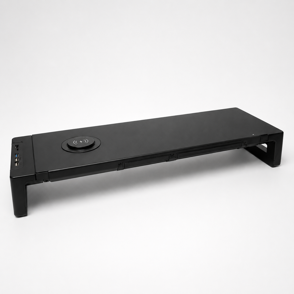 Command Monitor Riser with the built-in wireless charging pad visible on its top surface